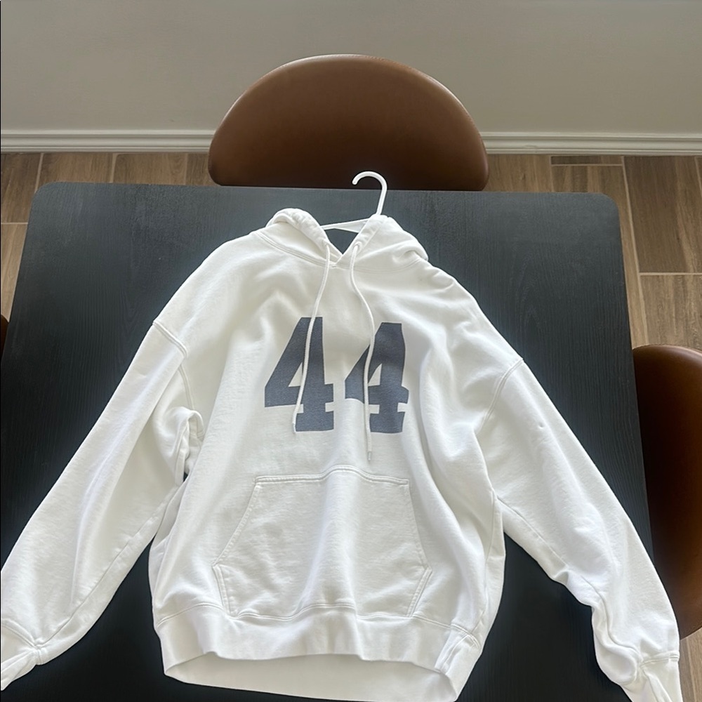 Brandy Melville White Hoodie with Navy Print.